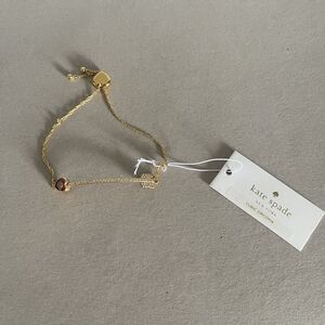 Kate Spade New York Gold Tone Cubic Zirconia Red Heart Arrow Bracelet